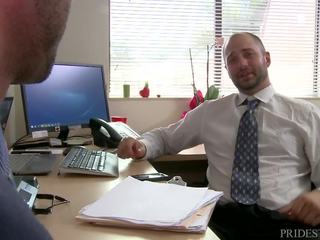 Perky Office Worker Gets Fucked Hard On A Desk By His Bosses