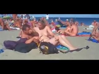 X ocenjeno posnetek s full-blown na na javno plaža