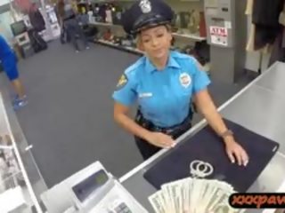 Busty babe Police Officer Pawn Her Weapon And Pussy For Cash